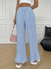Women’s: versatile checkered, ruffled, straight-leg pants that add a touch of freshness and youthful appeal