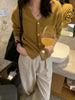 Korean version of autumn cashmere V-neck cardigan women loose short solid color sweater knit sweater simple coat