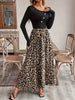 A women's black buckle long-sleeved stitched leopard print pendulum dress, retro casual style thin long skirt