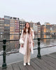 Elegant Faux Fur Collar Coat Women Winter Slim Patchwork Pocket Warm Trench Street Casual Long Faux Fox Fur Outerwear