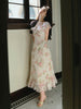 Delicate and charming little woman gentle demeanor wearing a versatile two-way style dress