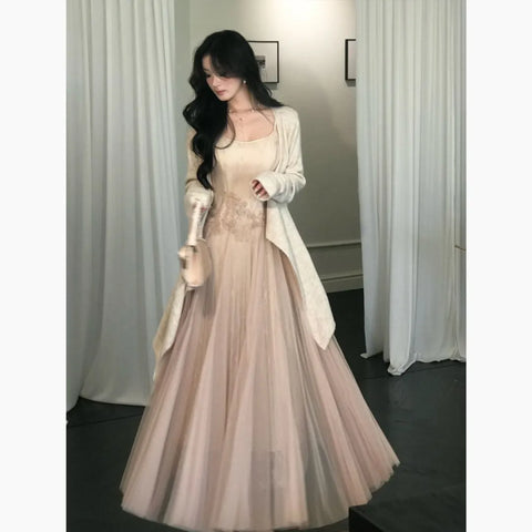 a ballet dance student, in an ultra-luxurious, large swing, gentle pink fishtail 3D lace dress