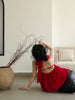 Will be available on the 30th at a price of 139! Red retro whitening loose off-shoulder backless women's top