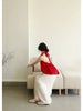 Will be available on the 30th at a price of 139! Red retro whitening loose off-shoulder backless women's top