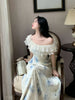 Highly recommends the Fei brand dress with irregular prints exuding a gentle and elegant charm