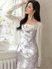 Scholarly silk-like brocade dress with gradient purple and subtle jacquard patterns exuding a gentle and sophisticated charm sling style
