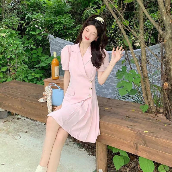 Women's Slim Fit Polyester Solid Color Short Sleeve Pullover Dress with Single Row Multiple Buckle Pleated Skirt in White