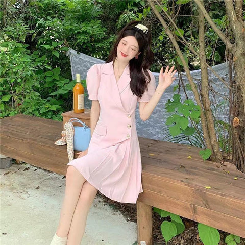 Women's Slim Fit Polyester Solid Color Short Sleeve Pullover Dress with Single Row Multiple Buckle Pleated Skirt in White