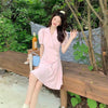 Women's Slim Fit Polyester Solid Color Short Sleeve Pullover Dress with Single Row Multiple Buckle Pleated Skirt in White