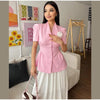 Women's Short-Sleeve Blazer with 3D Flower Detail and a Pleated Hem in Pink or Yellow