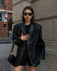 Women's Oversized Black Leather Blazer with Flap Pockets and Long Sleeves