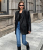 Women's Oversized Black Leather Blazer with Flap Pockets and Long Sleeves