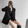 Women's Vintage Style Loose Fit Single Button Blazer with Notched Lapels and Buttoned Long Sleeves