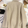 Women's Beige Double-Breasted Blazer with Notched Lapels and Textured Fabric