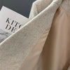 Women's Beige Double-Breasted Blazer with Notched Lapels and Textured Fabric