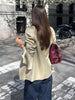 Women's Asymmetrical Blazer with Side Buttons and Ruffle Detail