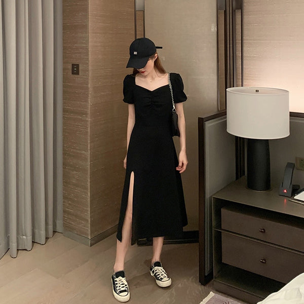 1276 early spring small black skirt seaside holiday beach skirt women's super fairy Sanya long skirt split black dress