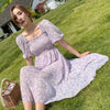 2022 summer style bubble sleeve high waist show thin flower open Pinellia purple flower medium length dress female