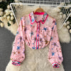 2023 women's spring lace stitching long-sleeved printed shirt + waist bag hip pleated fishtail skirt two-piece trendy suit