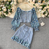 Age reduction suit spring 2022 female design sense floral puff sleeve stitching denim jacket short skirt