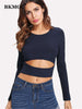 BKMGC Dark Blue Long Sleeve Round Neck Medium Stretch Sexy Hollow Out Waist Slim Fit Pullover Short Knitwear T Shirts for Women