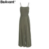 BeAvant Sexy back bow strap women jumpsuit Summer floral print boho beach jumpsuits Backless flare leg jumpsuits rompers
