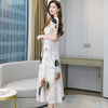 Chiffon dress women's 2022 summer short sleeve style, elegant, slim and slim, printed beach skirt