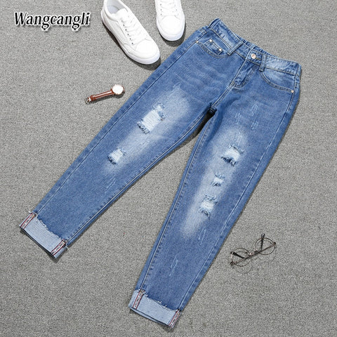 Large size women's denim nine pants 2022 spring and summer high waist hole 5XL Blue women's elastic feet pants 015#