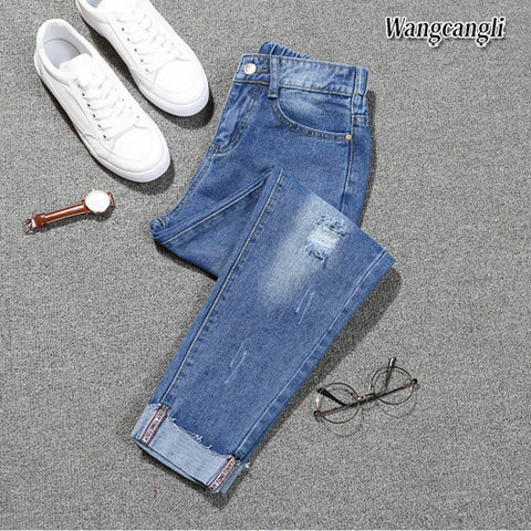Fashion Large size women's denim nine pants 2022 spring and summer high waist hole 5XL Blue women's elastic feet pants 015#
