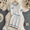 Girly sweet age-reducing knit sweater, short round neck short-sleeved top, two-piece suit, high waist bag hip skirt, short skirt