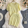 Girly sweet age-reducing knit sweater, short round neck short-sleeved top, two-piece suit, high waist bag hip skirt, short skirt