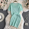 Girly sweet age-reducing knit sweater, short round neck short-sleeved top, two-piece suit, high waist bag hip skirt, short skirt