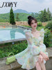 imCharms And Elegant Temperament Age-Reducing V-Neck Lotus Leaf Smudge Hollow Design Holiday Dress Female Summer