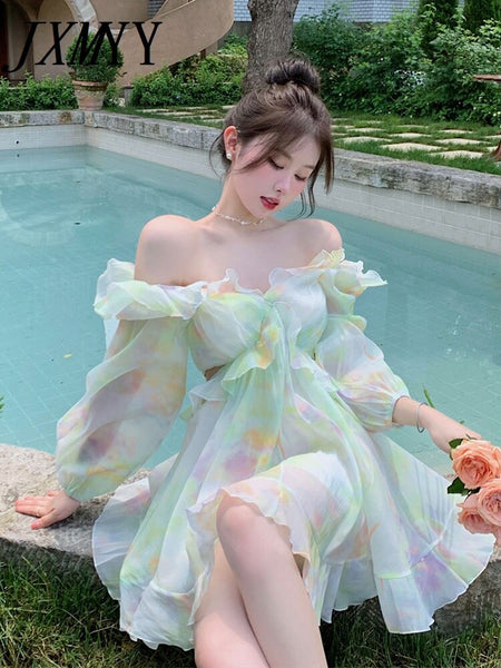 imCharms And Elegant Temperament Age-Reducing V-Neck Lotus Leaf Smudge Hollow Design Holiday Dress Female Summer
