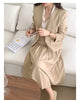 Korean chic retro V-neck three-button loose long-sleeved suit jacket + high-waist pleated A-line skirt suit