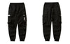 Men Cargo Joggers Pants Streetwear Hip Hop Ribbon Side Pockets Solid Harem Pants Autumn Harajuku Casual Baggy Trousers