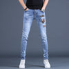 Men’s Light  Embroidery Badge Jeans,Prints Slim-fit Stretch Blue Jeans, Scratches&Ripped Casual Denim Pants;