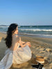 Sanya seaside holiday beach skirt pearl chain backlight fabric big bow dress super Fairy