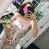 Sanya seaside holiday beach skirt women's 2022 super fairy temperament knee length skirt floral suspender dress