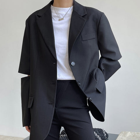 Spring and autumn women's casual solid color single-breasted pocket decoration split sleeve loose jacket